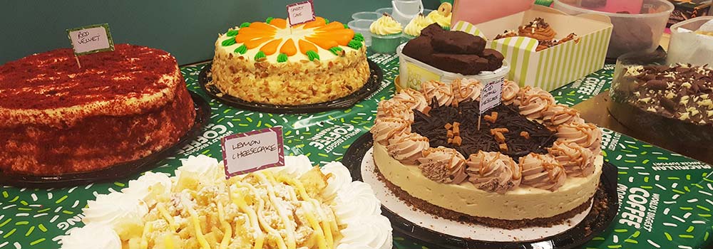 Scott Rees & Co selling cakes to fundraise for Macmillan Coffee Morning 2018